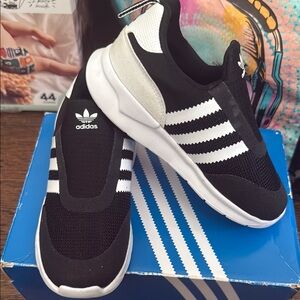 Adidas Black and White Sneakers Modern Slip-On Design